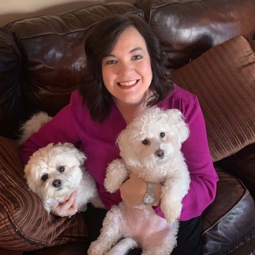 Tiffany B. Keeton with puppies